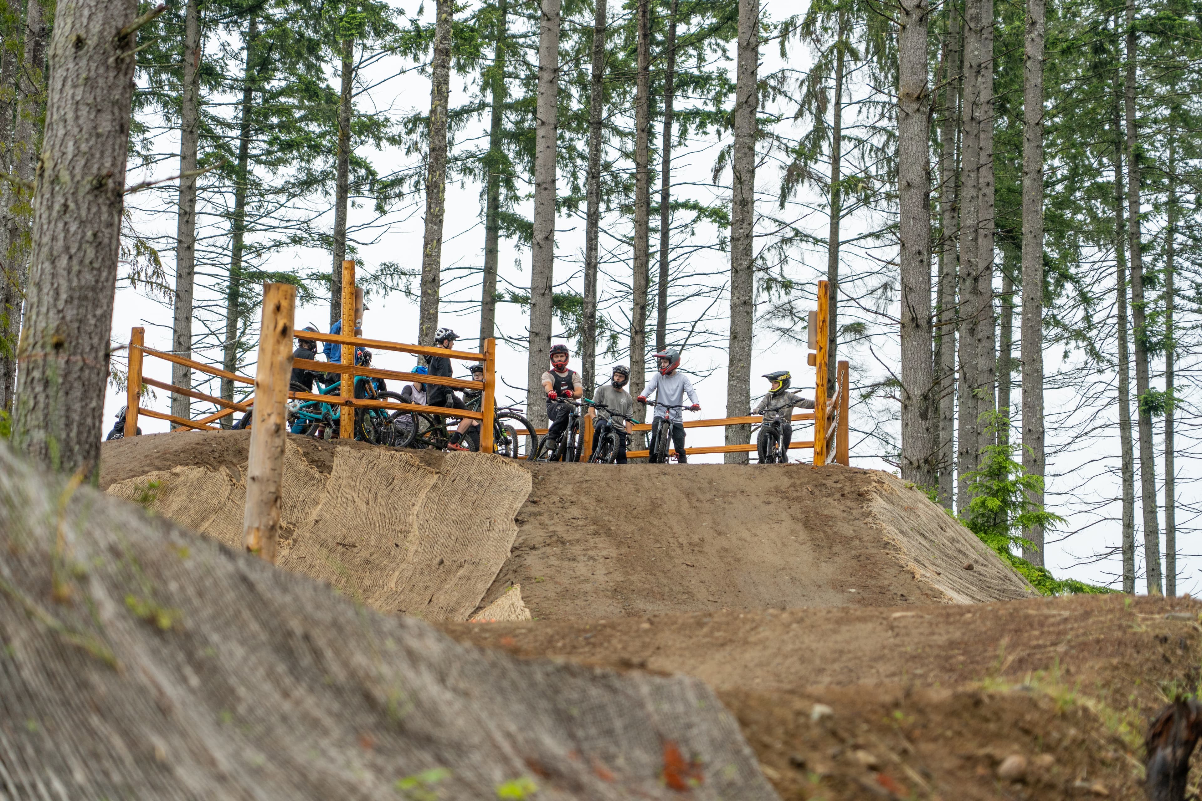 Rider sending a jump at Port Gamble Wednesday Night Ride